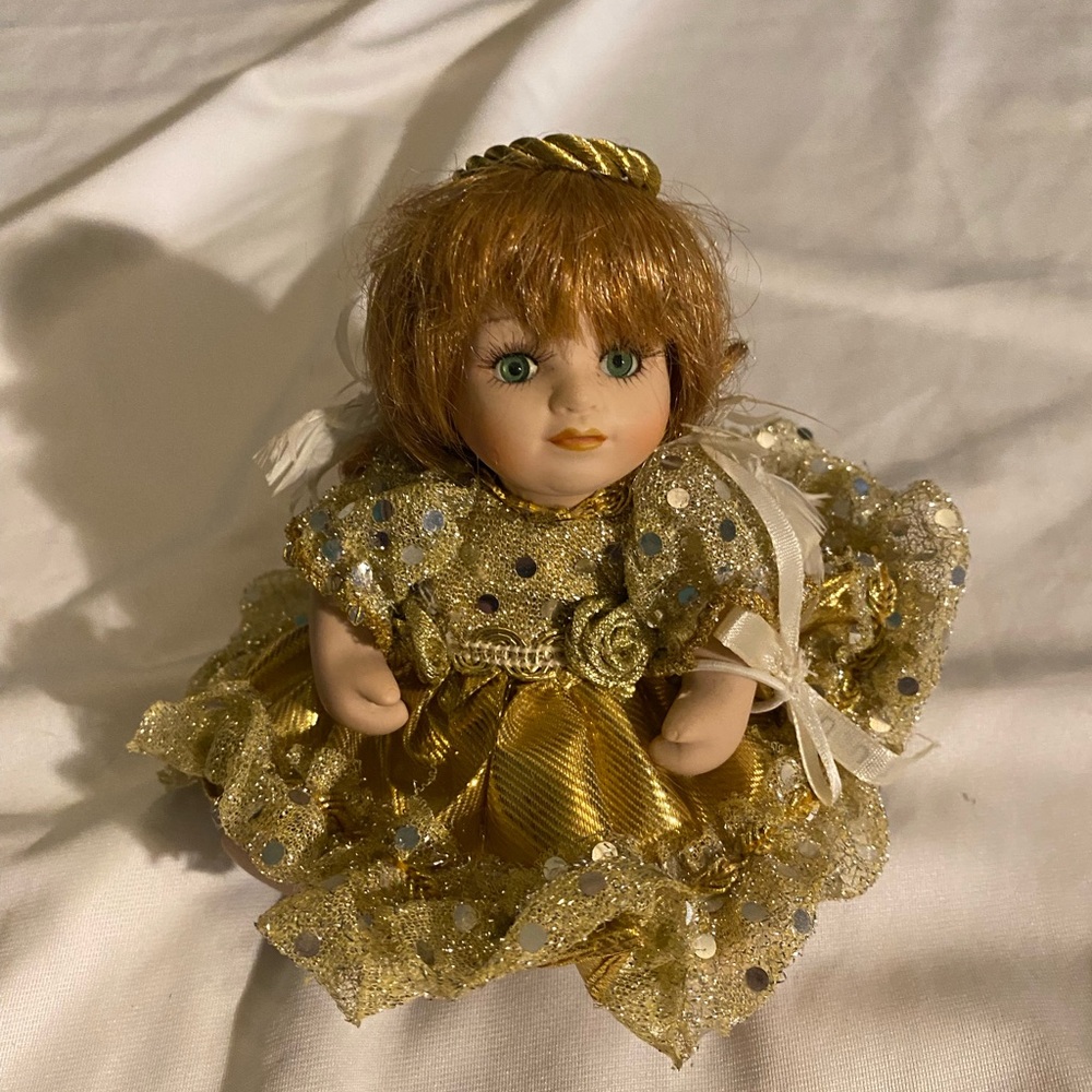 Porcelain Doll in Gold Sequin Dress with Bow and Ribbon Details Vintage
